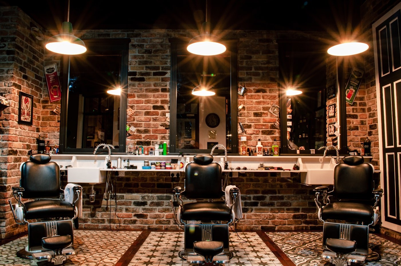 Illustrative barber chairs and stations — not a photo of Berkat Barbers